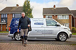 Stephen Fretwell locksmith walking from his van to a customer's property in Norton S8, Sheffield.